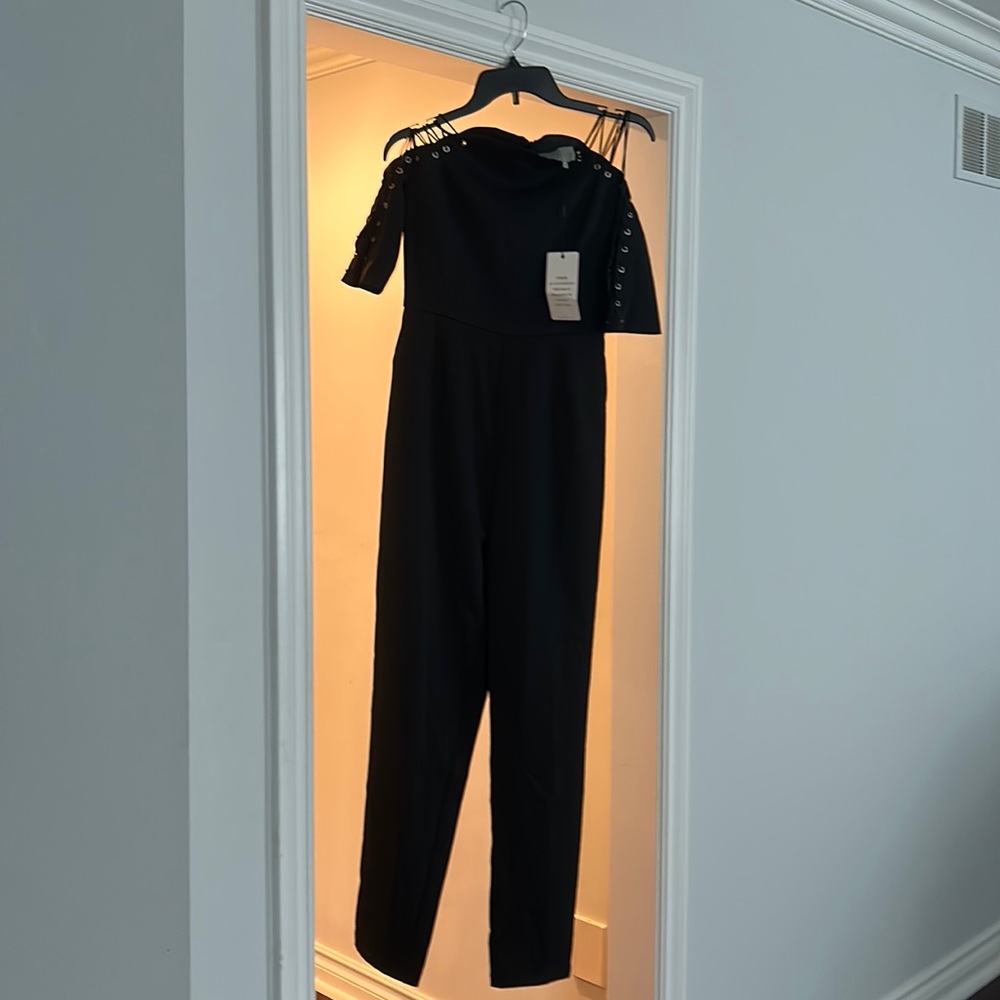 Black jumpsuit with lace tie on arms